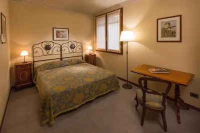 Letto o letti in una camera di Alle Roncole
