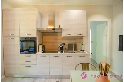 Cucina o angolo cottura di FuoriPorta Affitti Brevi - Residenza Bolzoni Oliva
