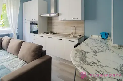Cucina o angolo cottura di FuoriPorta Affitti Brevi - Residenza Bolzoni Avio