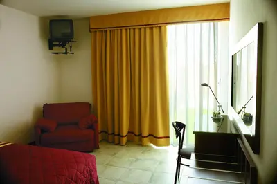 TV o dispositivi per l'intrattenimento presso La Corte Albergo Meublé