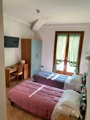 Letto o letti in una camera di Hotel Riviera Ristorante La Briciola