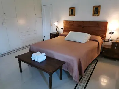 Letto o letti in una camera di Villa Rocca Leivi