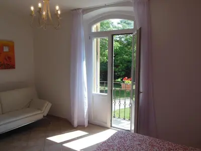 Letto o letti in una camera di Villa Meli Lupi - Residenze Temporanee