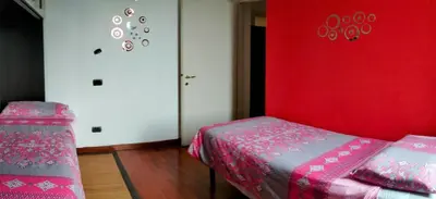 Letto o letti in una camera di Casa Cristina