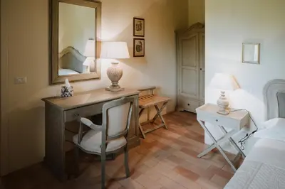 Letto o letti in una camera di Parco di Montebello