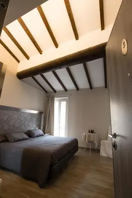 Letto o letti in una camera di Residenza Solferino