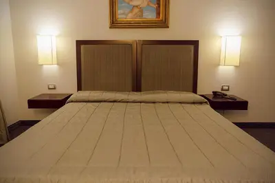 Letto o letti in una camera di Hotel dei Gonzaga