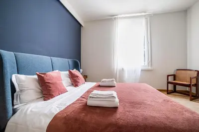 Letto o letti in una camera di GuestHost - Officina7 Large