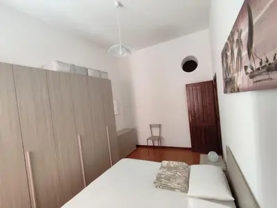 Letto o letti in una camera di Cozy flat cinque terre Moneglia