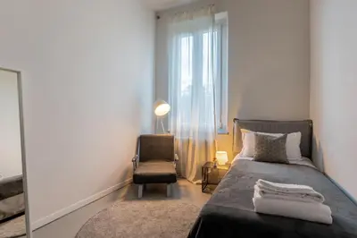 Letto o letti in una camera di GuestHost - CASA60
