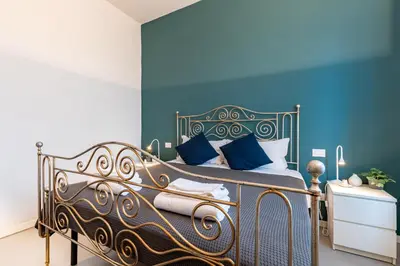 Letto o letti in una camera di GuestHost - CASA60