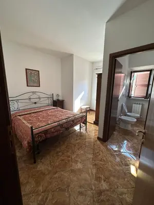 Letto o letti in una camera di Albergo Bar Ristorante Vecchio Mulino
