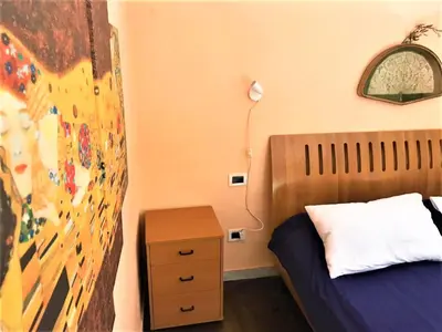 Letto o letti in una camera di SergioHome