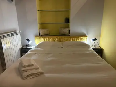 Letto o letti in una camera di 3T House Casa Vacanze Cremona