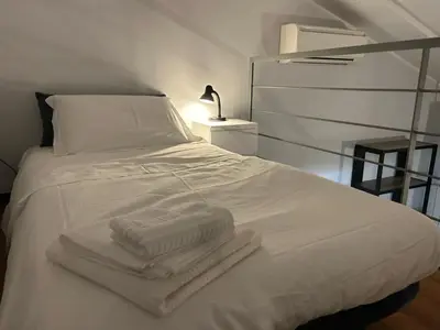 Letto o letti in una camera di 3T House Casa Vacanze Cremona