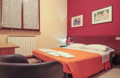 Letto o letti in una camera di Hotel Rose&Crown