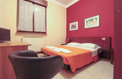 Letto o letti in una camera di Hotel Rose&Crown
