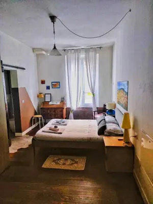 Letto o letti in una camera di A casa di Nat