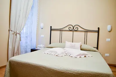 Letto o letti in una camera di Affittacamere in Piazzetta
