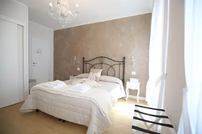 Letto o letti in una camera di Affittacamere in Piazzetta