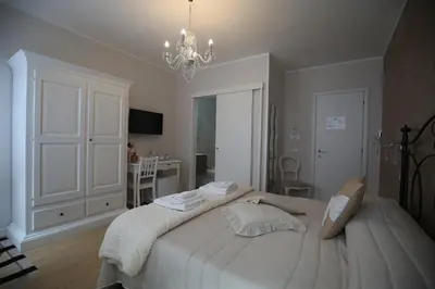 Letto o letti in una camera di Affittacamere in Piazzetta