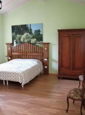 Letto o letti in una camera di Il Giardino Del Conte Custoza