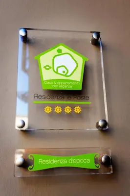 Certificato, attestato, insegna o altro documento esposto da Palazzo Le Poste - Suite and Apartments