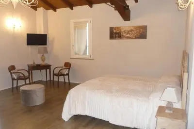 Letto o letti in una camera di Antico Podere Emilia