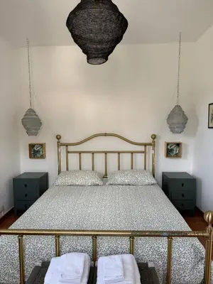 Letto o letti in una camera di VILLA ATRIS
