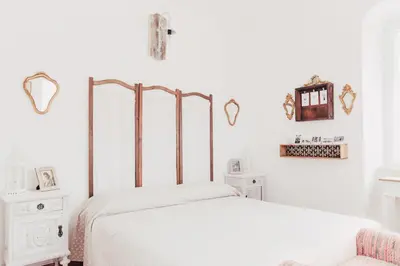 Letto o letti in una camera di VILLA ATRIS