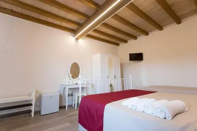 Letto o letti in una camera di Ca' del Passero b&b