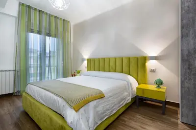 Letto o letti in una camera di B&B Campari 10