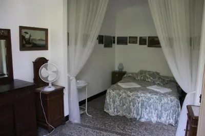 Letto o letti in una camera di Villa Anita