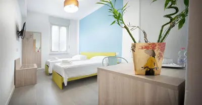 Letto o letti in una camera di b&b Amaca
