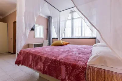 Letto o letti in una camera di Hotel Maris