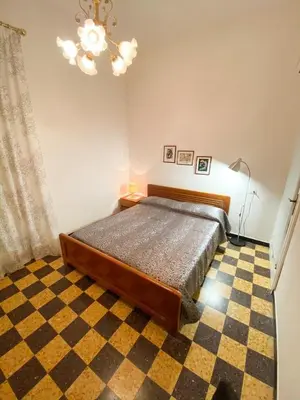 Letto o letti in una camera di Grillo apartment