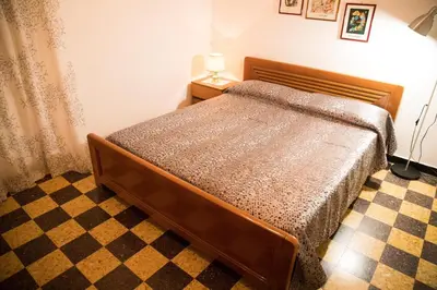 Letto o letti in una camera di Grillo apartment