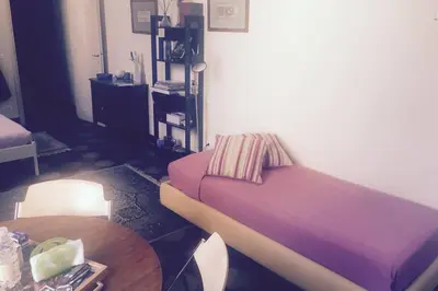 Letto o letti in una camera di Cozy apartment in Palazzo Malaspina