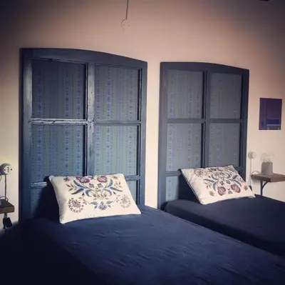 Letto o letti in una camera di Romantic apartment garden parking in Parma city Villa Podere Merlo