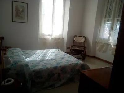 Letto o letti in una camera di ANTICO BORGO AL MARE