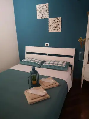 Letto o letti in una camera di Borgo Fiore House