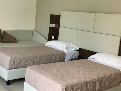 Letto o letti in una camera di B&B Bertani
