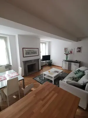 Area soggiorno di Parma Central Apartments