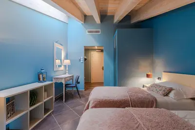 Letto o letti in una camera di AL TORRIONE