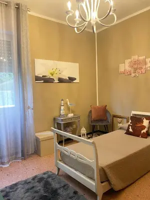 Letto o letti in una camera di Casa Perla
