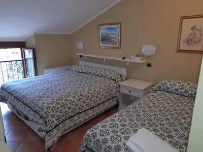 Letto o letti in una camera di affittacamere la loggia