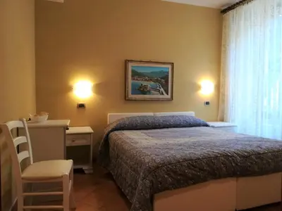 Letto o letti in una camera di affittacamere la loggia
