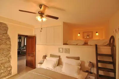 Letto o letti in una camera di B&B Casale delle farfalle