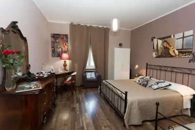 Letto o letti in una camera di Segui le note della Tua vita