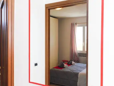 Letto o letti in una camera di La perla rossa